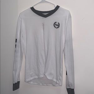 A pink long sleeve shirt